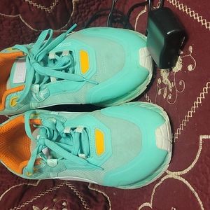 mint green puma sneakers